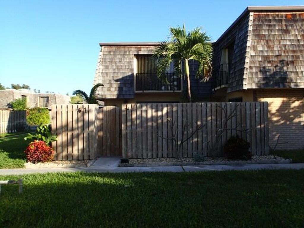 Photo of 61 Lake Arbor Drive, Palm Springs, FL 33461 (MLS # R10995732)