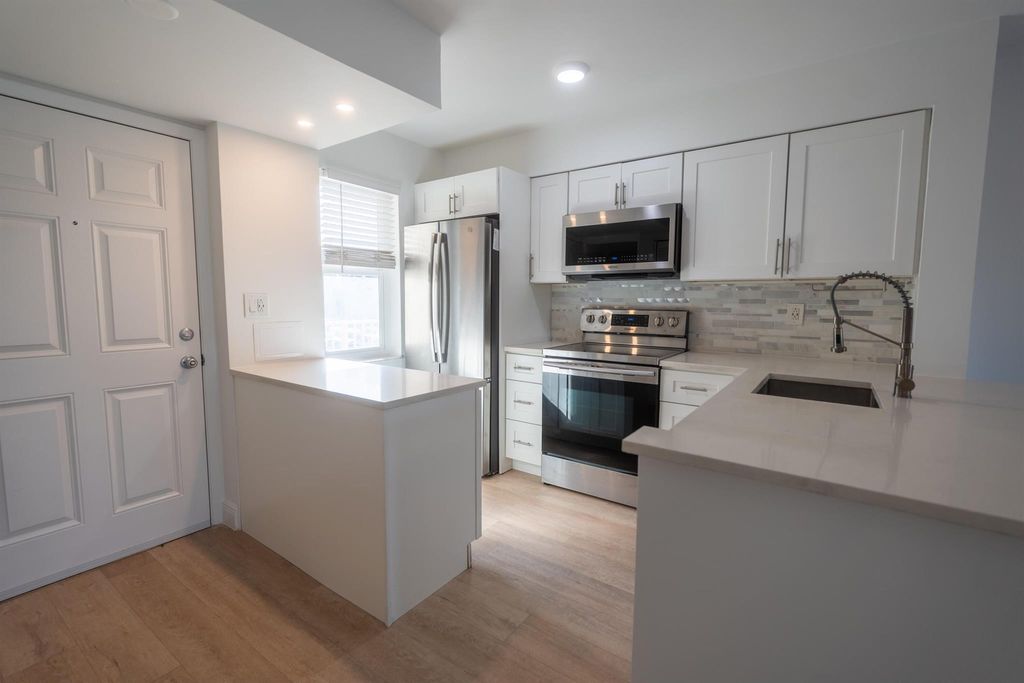 Photo of 2108 S Cypress Bend Drive #210, Pompano Beach, FL 33069 (MLS # R11140574)