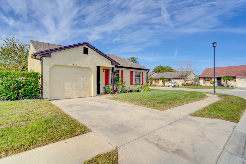 Photo of 1302 SE Remington Court, Port Saint Lucie, FL 34952 (MLS # R10949156)