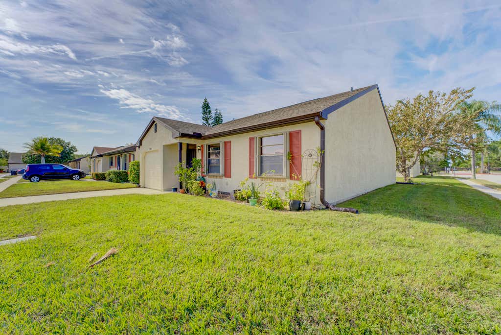 Photo of 1302 SE Remington Court, Port Saint Lucie, FL 34952 (MLS # R10949156)