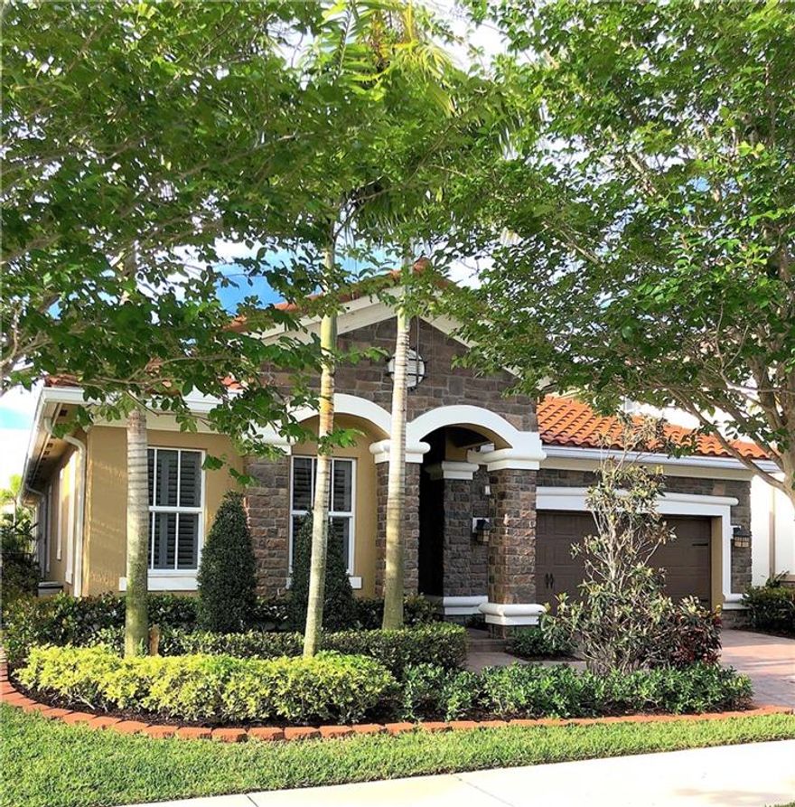 Immaculate upgraded home with white kitchen and soft-close doors and drawers, beautiful granite counters, glass backsplash, and Stainless Steel appliances. 20” tile and wood flooring thru-out. Large master suite and split bedroom plan. Home has 10’ ceilings and crown molding. All impact windows and doors! Heated saltwater pool! 2 car garage, paver driveway, lushly landscaped & more! Fantastic family community with lighted streets, sidewalks, and bike lanes.  Magnificent clubhouse and amenities.  Shopping, restaurants, hospitals, houses of worship, and expressway all close by.