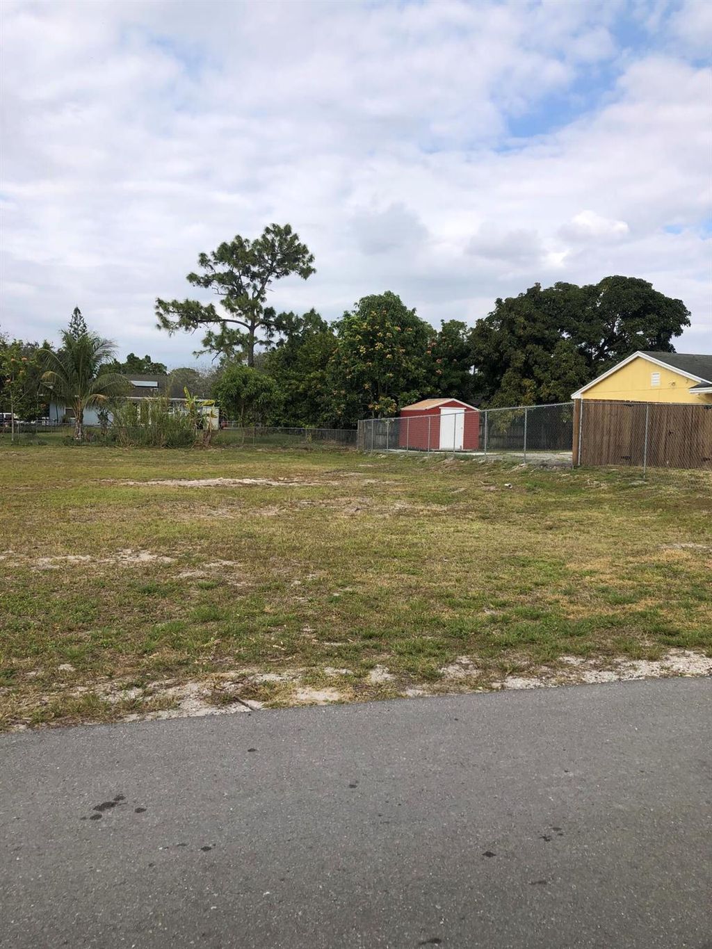 Photo of 15449 Los Angeles Drive, Loxahatchee Groves, FL 33470 (MLS # R10951588)