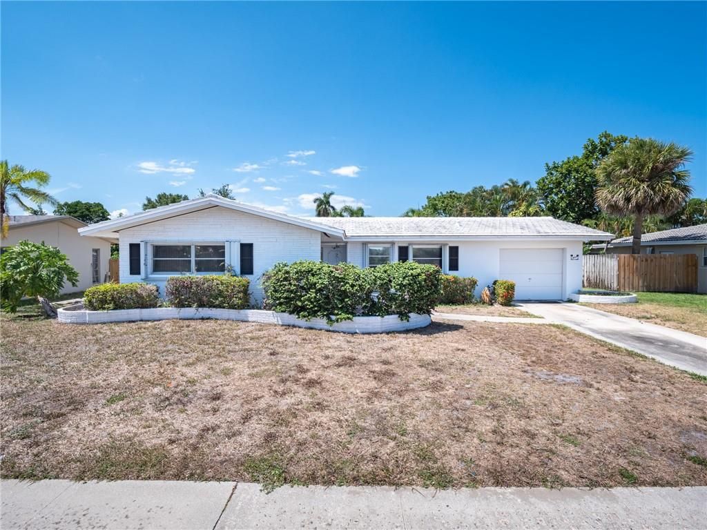 Photo of 1401 W Camino Real, Boca Raton, FL 33486 (MLS # F10283835)