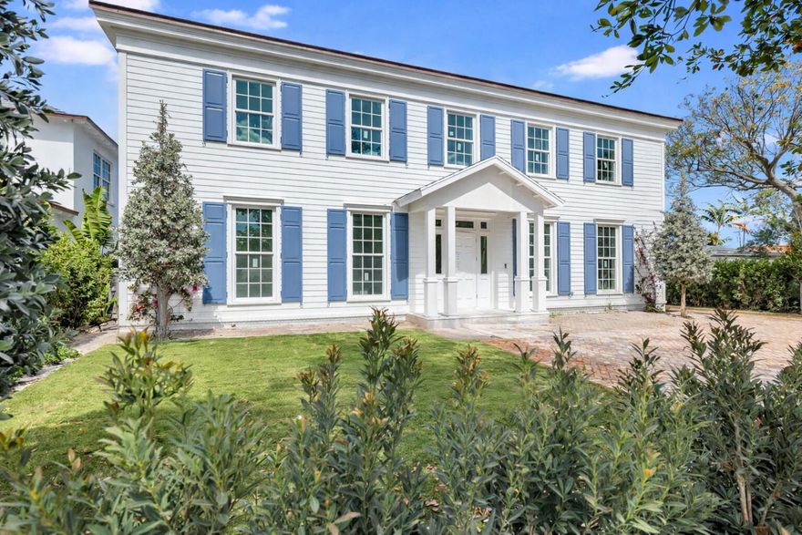 Welcome to this newly constructed 4 bedroom, 5.5 bathroom Colonial residence by Smith Kellogg Architecture, ideally situated in the coveted SoSo neighborhood. Offering 5,278 total sqft, the home features white oak wood floors throughout and a thoughtfully designed layout. The main level includes a spacious living room with a fireplace and a wet bar featuring a beverage fridge, wine fridge, and ice maker, plus a dedicated dining room and an expansive chef's kitchen outfitted with Thermador appliances along with a charming banquette breakfast nook. The main-floor primary suite offers a spa-inspired bath featuring dual vanities, a Roman tub, a private water closet, and a large walk-in closet. Upstairs, three additional bedrooms each feature en-suite baths, including a junior primary suite with dual vanities, a separate walk-in shower, Roman tub, and a generous walk-in closet. Outdoor living is equally impressive with a saltwater pool powered by Jandy equipment with iPhone control, complemented by a covered loggia and surrounded by a refined hardscape mix of Chicago brick and limestone. Additional highlights include an oversized 2-car garage and a whole house generator. Ideally located just 1.5 blocks from the Intracoastal and moments to everything West Palm Beach has to offer, including excellent dining, shopping, and entertainment.