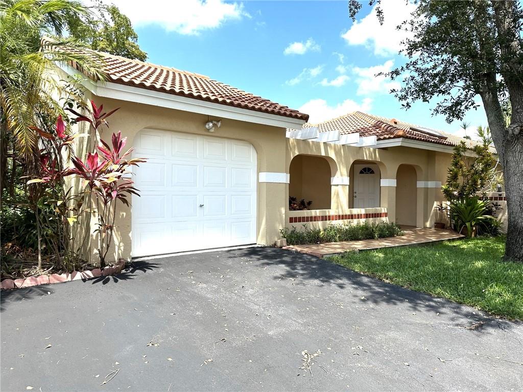 Well maintained home in Garden Homes sits on a corner lot on a quiet cul-de-sac. Spacious home with loads of potential, features vaulted ceilings, inside utility room with washer/dryer, and large living/dining area. Split bedroom plan, and master suite features a huge walk-in closet, plus an additional 6x8 area, perfect as a home office or nursery. New exterior breaker panel. 2009 roof. Front roof patio, and rear roofed and screened patio lead to privacy fenced backyard, plenty of room for dogs and/or swing set. Maintenance fee includes mowing of front yard, common area maintenance, and beautiful swimming pool. One car garage with double driveway plus additional parking nearby. Convenient to shopping, hospital, dining, schools.