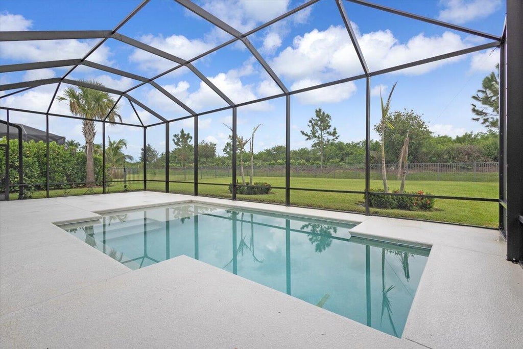 Photo of 9323 SW Pinnacle Place, Port Saint Lucie, FL 34987 (MLS # B26078739)