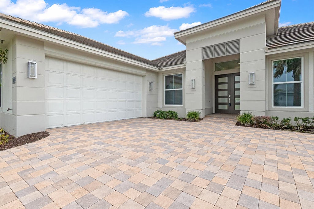 Photo of 9323 SW Pinnacle Place, Port Saint Lucie, FL 34987 (MLS # B26078739)