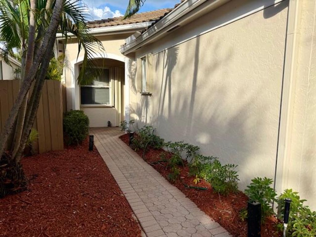 Photo of 2409 NW 66th Drive, Boca Raton, FL 33496 (MLS # R11151339)