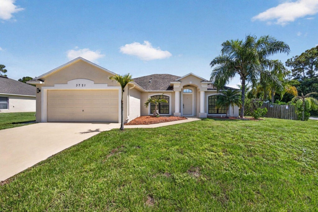 Photo of 3721 SW Masilunas Street, Port Saint Lucie, FL 34953 (MLS # B26081532)