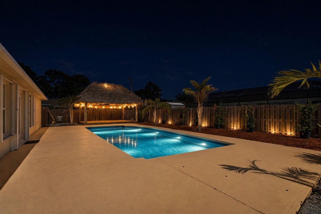 Photo of 3721 SW Masilunas Street, Port Saint Lucie, FL 34953 (MLS # B26081532)
