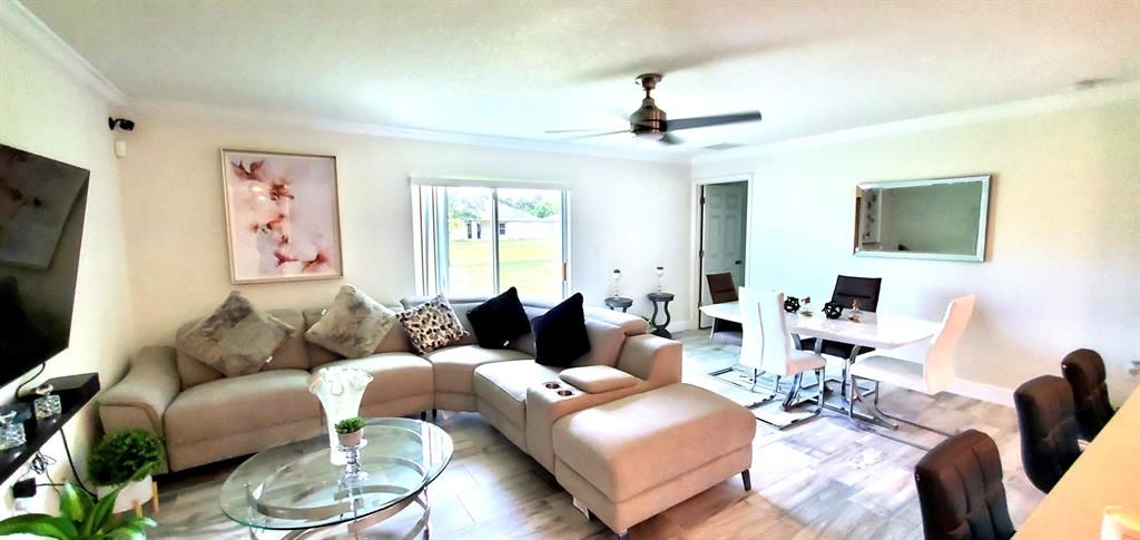 Photo of 1062 SW Sudder Avenue, Port Saint Lucie, FL 34953 (MLS # R10732760)