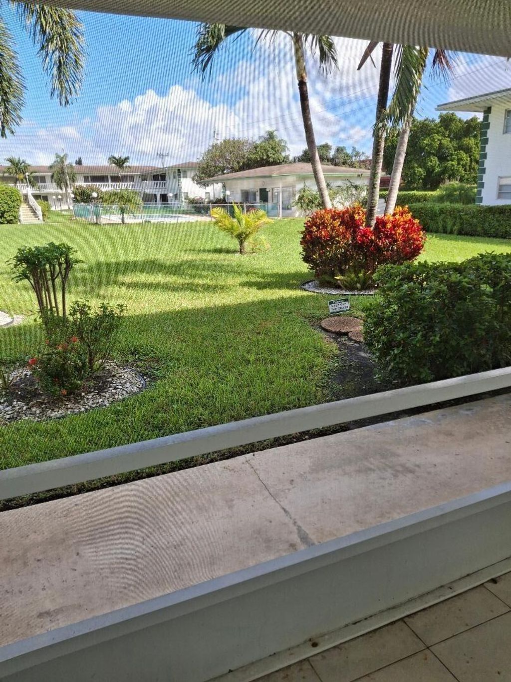 Photo of 1621 NW 46th Avenue #101, Lauderhill, FL 33313 (MLS # B26019258)