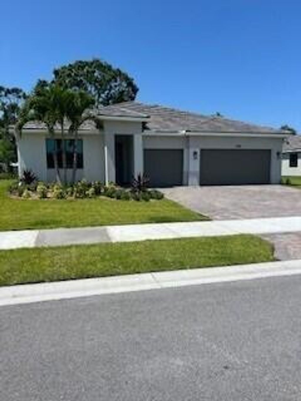 Photo of 1480 SW Lago Circle, Palm City, FL 34990 (MLS # R10990885)