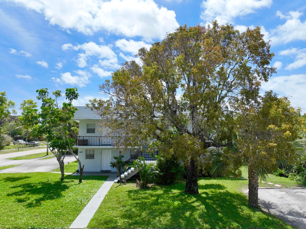 Photo of 906 Foresteria Drive, Lake Park, FL 33403 (MLS # B26066747)