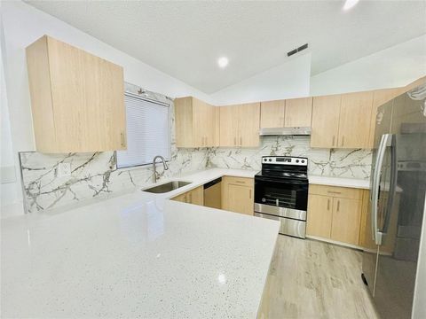 Tiny photo for 714 Holly Street, North Lauderdale, FL 33068 (MLS # F10475945)