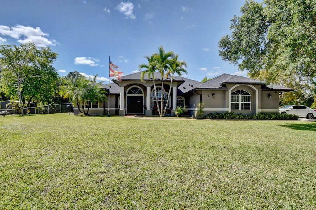 Photo of 17580 Orange Grove Boulevard Blvd, West Palm Beach, FL (MLS # R10789750)