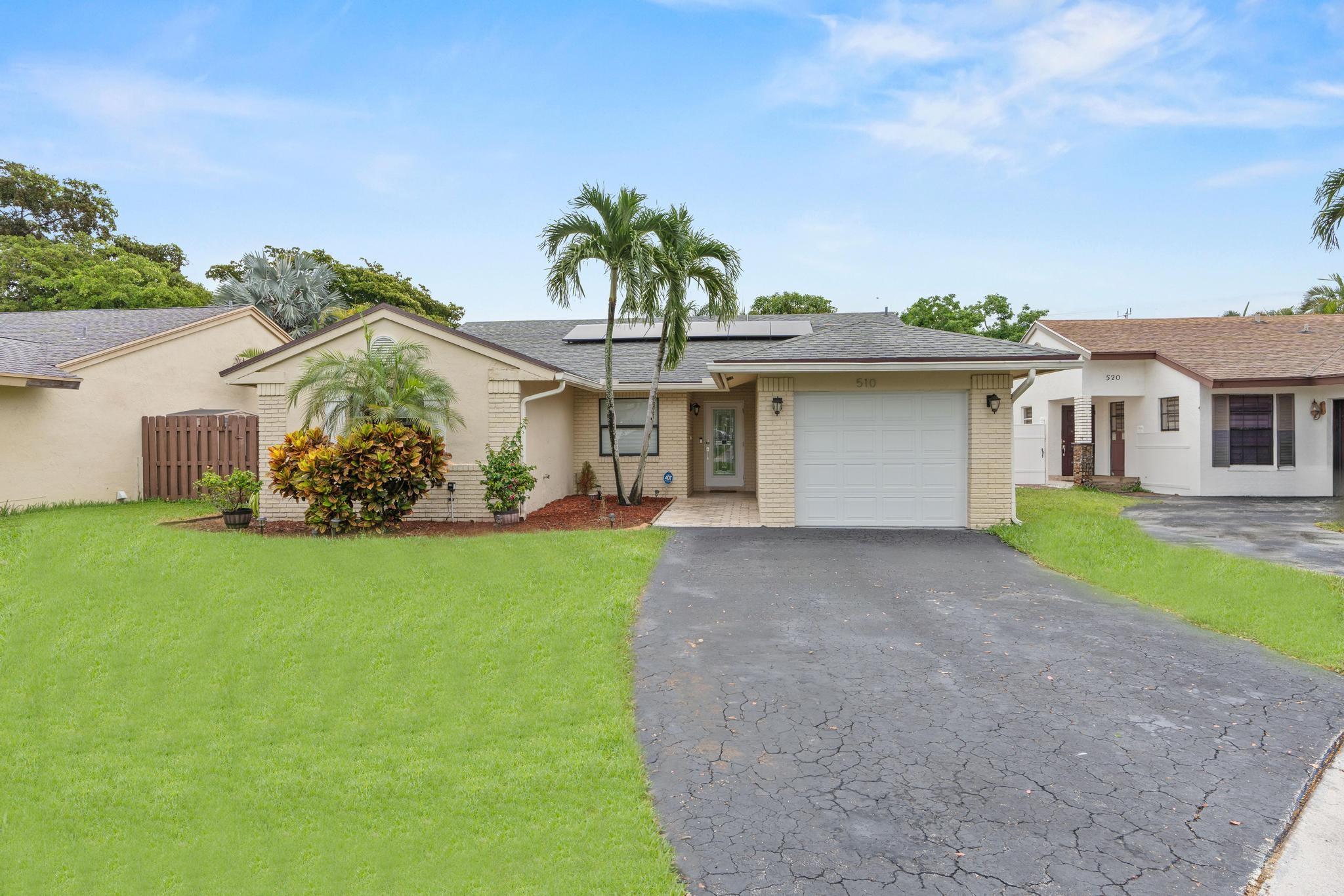 Welcome to your dream retreat in the heart of Davie! This beautifully updated home features a bright and airy layout, soaring vaulted ceilings, and sleek tile flooring throughout. All impact windows and solar panels ensure peace of mind and energy efficiency, while brand new appliances and ample natural light elevate your daily living experience. Enjoy the luxury of walk-in closets with built-ins, a spacious one-car garage, and a backyard that’s perfect for entertaining or creating your personal oasis. This property isn’t just a home—it’s a lifestyle. Whether you're upsizing, investing, or finding your forever nest, this one checks all the boxes with style, space, and South Florida charm.