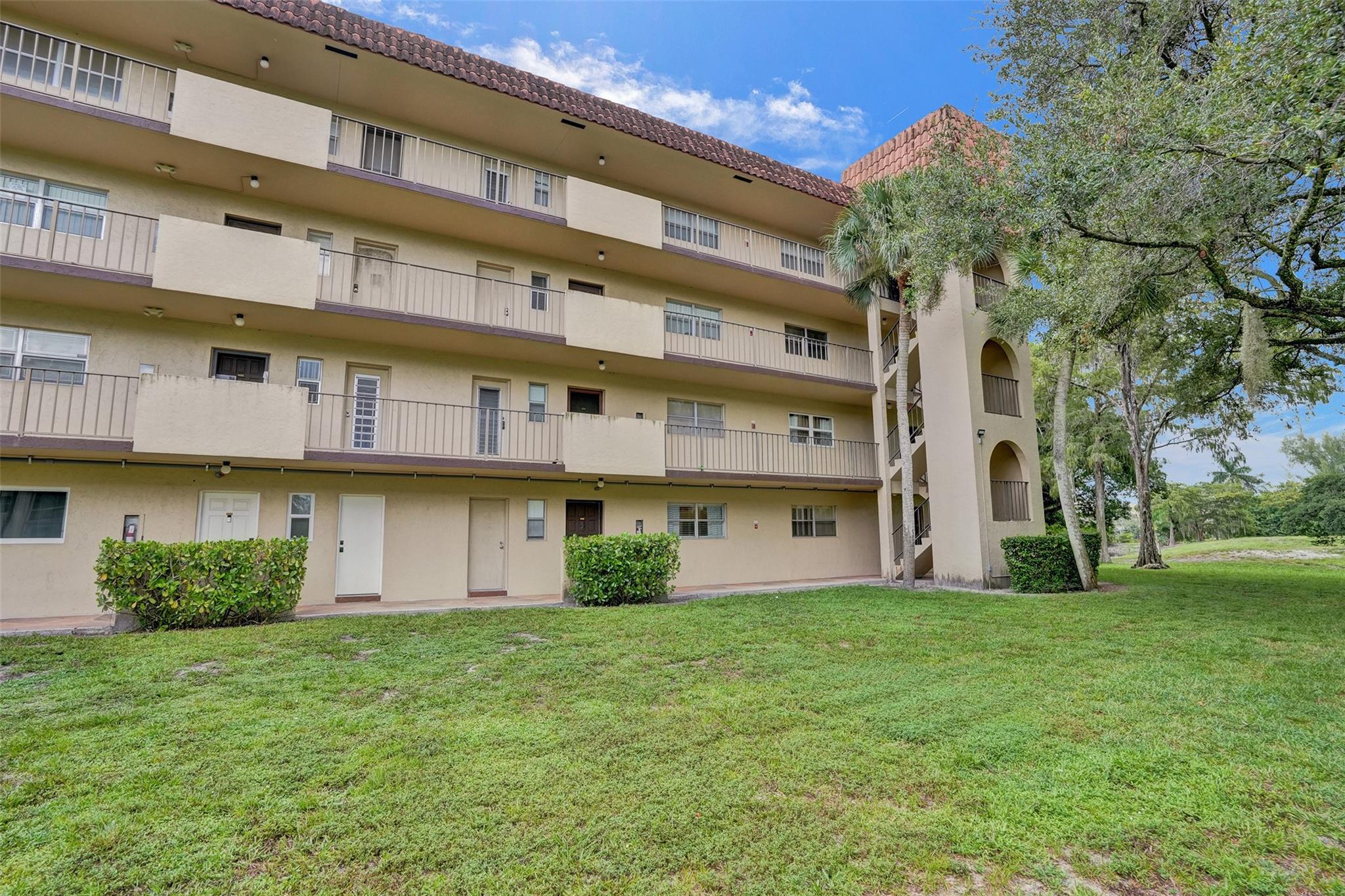 Step into this beautifully updated 2 bed, 2 bath condo where modern style meets everyday comfort. Both bedrooms feature en-suite baths and spacious walk-in closets making the home feel like it has two primary suites. Enjoy open living and dining areas with room for a home office. Relax on your screened walk-out patio with peaceful views. Located in the gated Falls of Inverrary with a community pool, walking paths, tons of guest parking, and laundry on every floor — this is the perfect blend of privacy, convenience, and style.