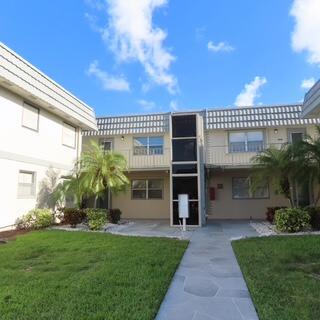 Don't miss this conveniently located updated 1st floor corner condo in great well mainatined building in gated KingsPoint Brittany community convenient to Monaco & main clubhouse. This updated clean condo is carpet free &s is situated in the middle of the building with peaceful garden views next to the mailboxes & is vacant & ready for a new owner. Enjoy a new kitchen complete with dishwasher , updated bathrooms, walk in closet , washer & dryer & great outdoor spacious screened patio with green garden view. Take advantage of the amazing active lifestyle including tennis, golf, pickleball, bocce, swimming, fitness center, theater, spa, shows, clubs, dining options & a kings point shuttle service to take you to & from the clubhouse, shopping & more. Maintenance includes all amenities +
