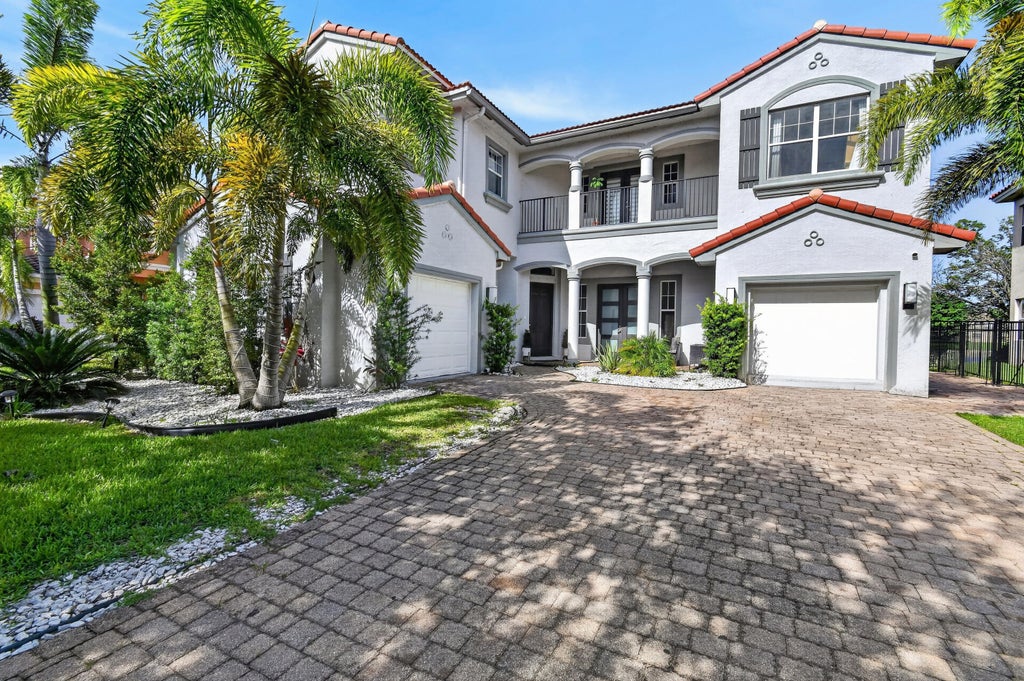 Photo of 700 Cresta Circle, West Palm Beach, FL 33413 (MLS # B26051288)
