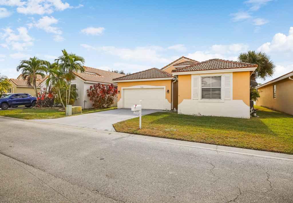 Photo of 9556 Lago Drive, Boynton Beach, FL 33472 (MLS # R11047158)