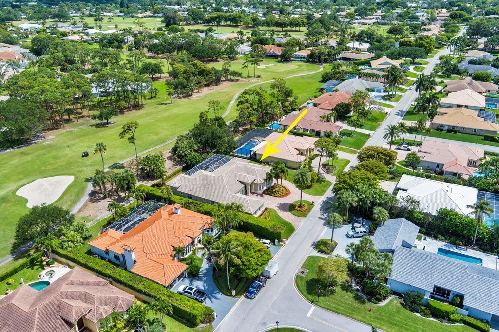 Photo of 594 N Country Club Drive, Atlantis, FL 33462 (MLS # B26027467)