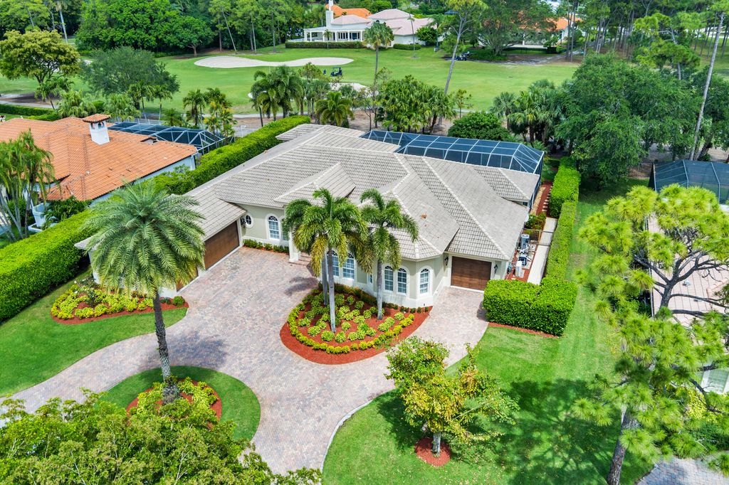 Photo of 594 N Country Club Drive, Atlantis, FL 33462 (MLS # B26027467)