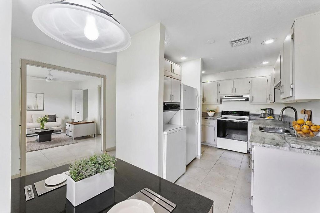 Photo of 1521 NW 18th Avenue #103, Delray Beach, FL 33445 (MLS # R11107243)