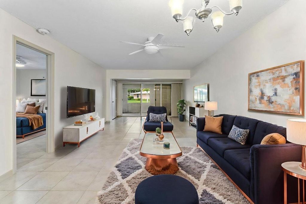 Photo of 1521 NW 18th Avenue #103, Delray Beach, FL 33445 (MLS # R11107243)
