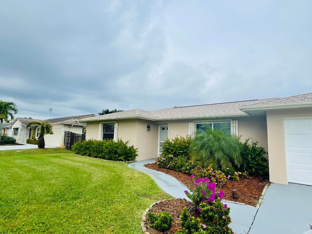 Photo of 667 SE Crescent Avenue #2, Port Saint Lucie, FL 34984 (MLS # R10947923)