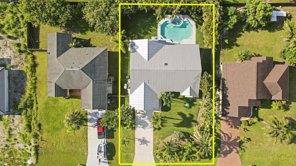 Photo of 1038 SW Macao Avenue, Port St Lucie, FL 34953 (MLS # R10897915)