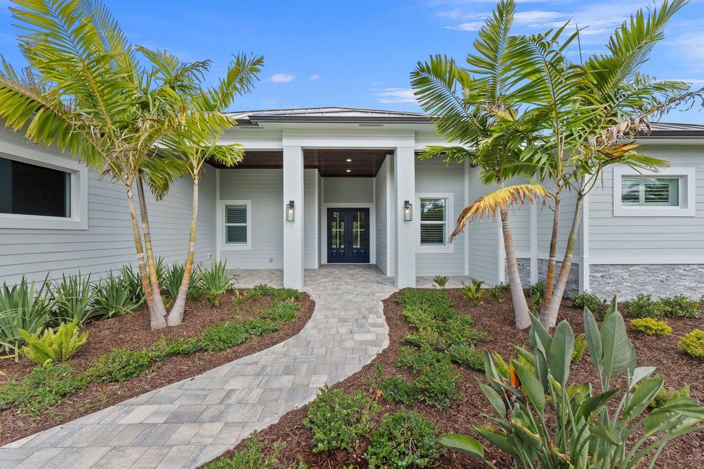 Photo of 10375 SW Stones Throw Terrace, Palm City, FL 34990 (MLS # R11089784)