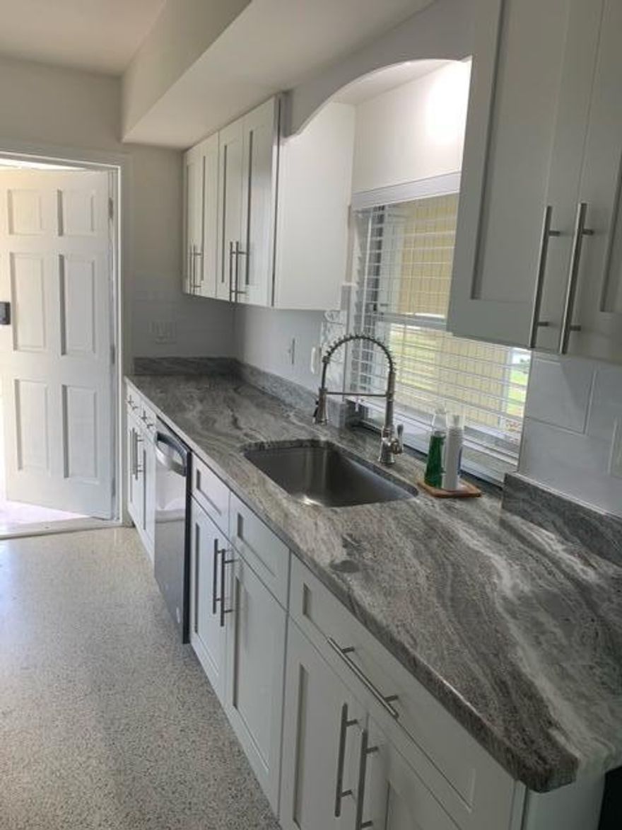 Furnished, move-in ready rental, updated kitchen with granite countertops and newer appliances. updated bathrooms. Multiple sliding doors leading to a large screened, covered patio with laundry room. Spacious yard.  No HOA. Available for immediate occupancy.