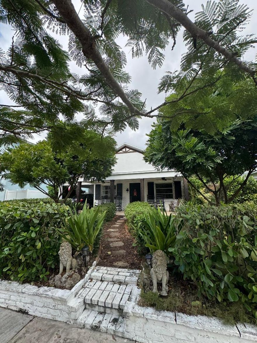 Single family home,1 story, brick exterior, 2/2, updated bathrooms, kitchen, covered front porch, back yard with paver patio with lighting and firepit, new wood laminate flooring, all white interior with abundant natural light throughout.