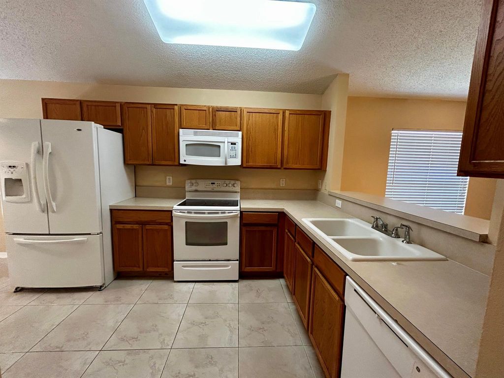 Photo of 830 NW Greenwich Court, Port Saint Lucie, FL 34983 (MLS # R11077766)