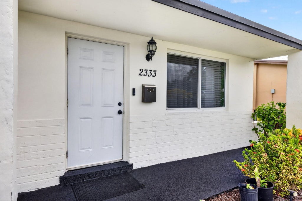 Photo of 2333 NW 82ND Way NW, Sunrise, FL 33322 (MLS # B26072315)
