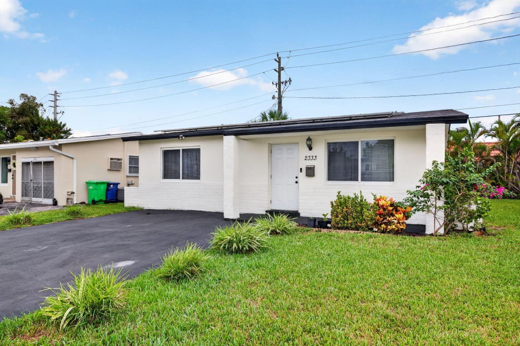 Photo of 2333 NW 82ND Way NW, Sunrise, FL 33322 (MLS # B26072315)