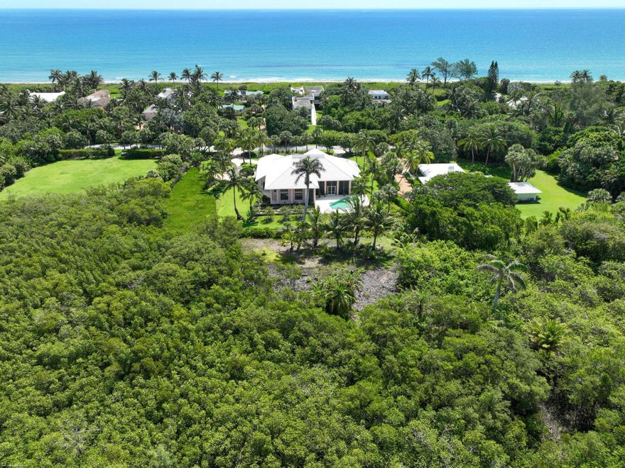 Walk to the beach from this private and tranquil 4 bedroom 4.5 bath house sitting on lush Jupiter Island. The separate primary bedroom features two large walk-in closets and access to the pool and expansive screened outdoor space which is perfect for relaxing or alfresco entertaining. Inside, the main rooms are connected and provide openness and light throughout. Three additional guest bedrooms each with their own en-suite baths offer complete privacy for guests and extended family. There is a 2 car plus 1 golfcart garage. Proximity to Bridge Rd allows for easy access on and off the Island.