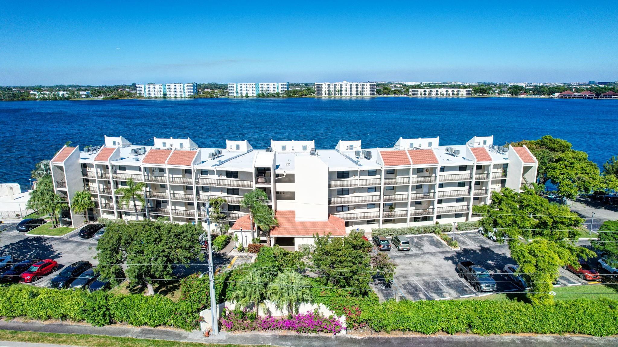 Escape to your own private oasis in this stunning waterfront property. With breathtaking views of the lake, and plenty of outdoor space, you’ll feel like you’re on vacation every day. Nestled within the biggest man made lake in Broward County, this condo offers the perfect blend of comfort, convenience, and resort-style living. As a resident of Lake Emerald, you'll enjoy access to an abundance of amenities, including 3 full-size pools , tennis courts, picnic area and a state-of-the-art gymnasium. Pamper yourself with locker rooms equipped with saunas and steam rooms for ultimate relaxation. New roof and building is 40 years certificated.