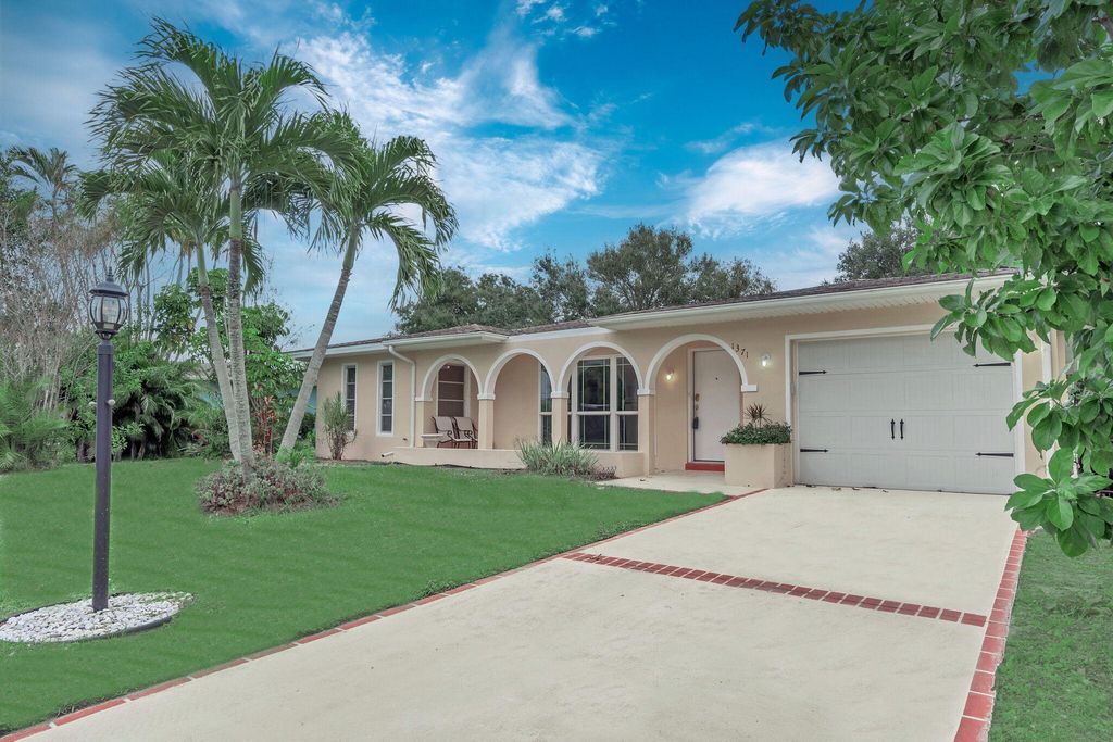 Photo of 1371 SE San Souci Lane, Port Saint Lucie, FL 34952 (MLS # R11148670)