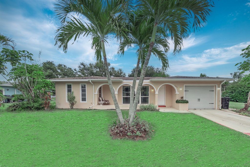 Photo of 1371 SE San Souci Lane, Port Saint Lucie, FL 34952 (MLS # R11148670)
