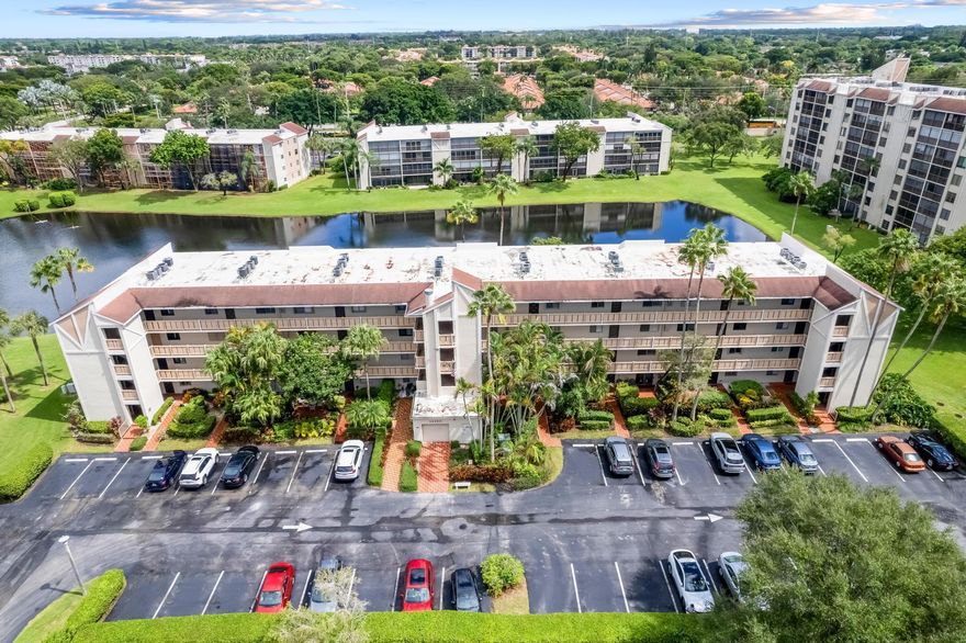 Welcome to this stunning, recently fully renovated condo. Shows like a model condo.  All new. Kitchen, Bathrooms, highend flooring, Ceilings skinned, Beautiful lighting in living and main bedroom. Great closet organizers.  Hurricane impact windows, accordian shutters for the balcony. Full sized washer/dryer. Gorgeous long balcony w/ direct lake view. AC is 2021. WH is 2024. Assessment is paid in full.  Section 1 has it's own clubhouse, saltwater pool, jaccuzi, BBQ, private functions and activities. Don't miss out on the Magnificent renovated clubhouse and sports facilities.. 610 seat theater, 350 seat banquet room, 2 card rooms, billiard room, aerobic and weight rooms, indoor pool, 9 pickleball, 4 Har tru tennis courts, 3 paddle tennis courts, and clubs galore. Welcome to paradise!!!