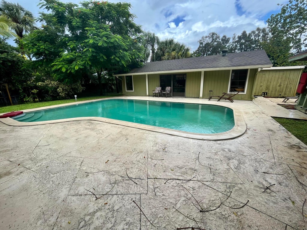 Photo of 4949 Belvedere Road #Cottage, West Palm Beach, FL 33415 (MLS # B26080742)