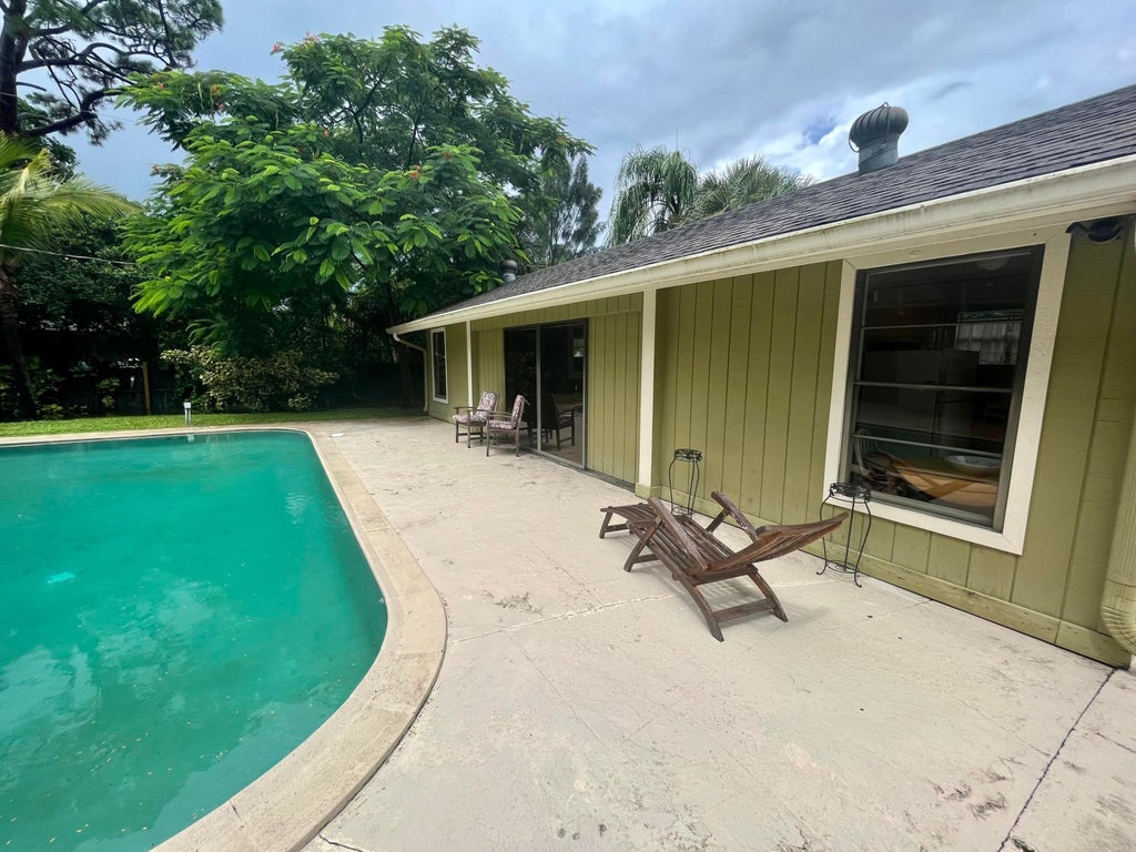 Photo of 4949 Belvedere Road #Cottage, West Palm Beach, FL 33415 (MLS # B26080742)