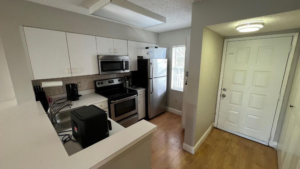 Photo of 2236 N Cypress Bend Drive #403, Pompano Beach, FL 33069 (MLS # F10466957)