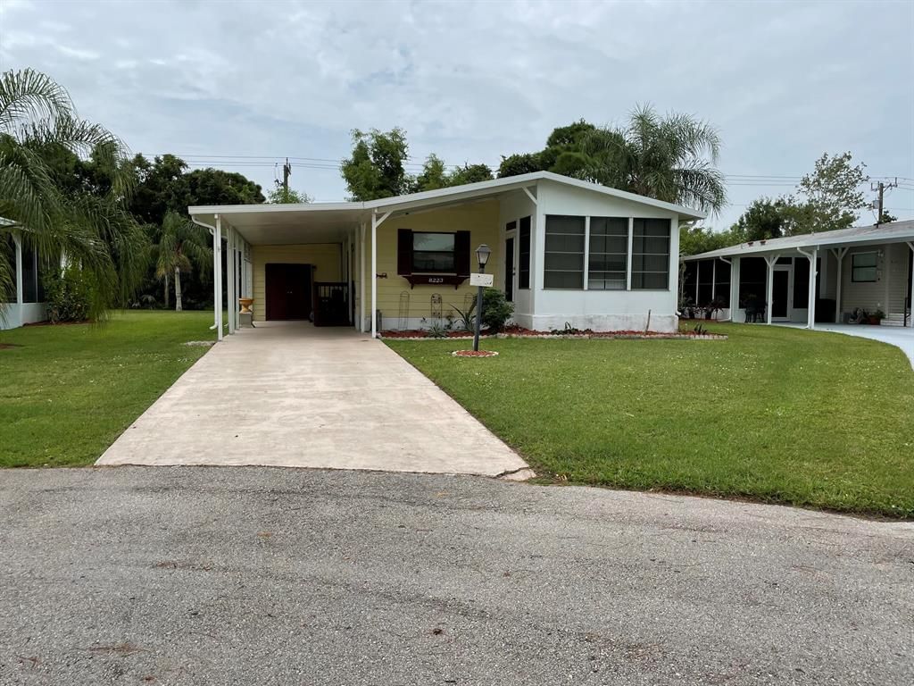Photo of 8223 W Bitterbush Lane, Fort Pierce, FL 34952 (MLS # R10741120)