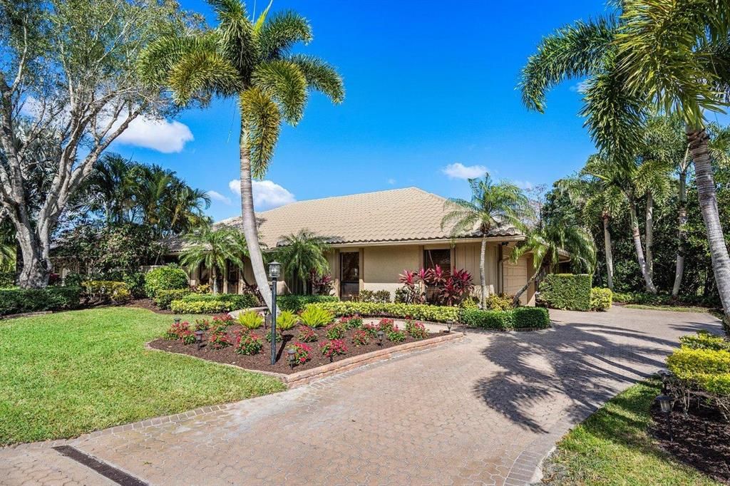 Photo of 54 Dunbar Road, Palm Beach Gardens, FL 33418 (MLS # R10688866)