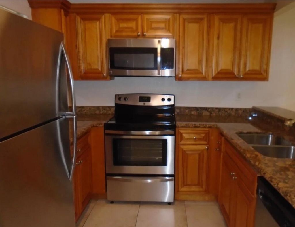 Photo of 1421 Windorah Way #H, West Palm Beach, FL 33411 (MLS # R11161604)