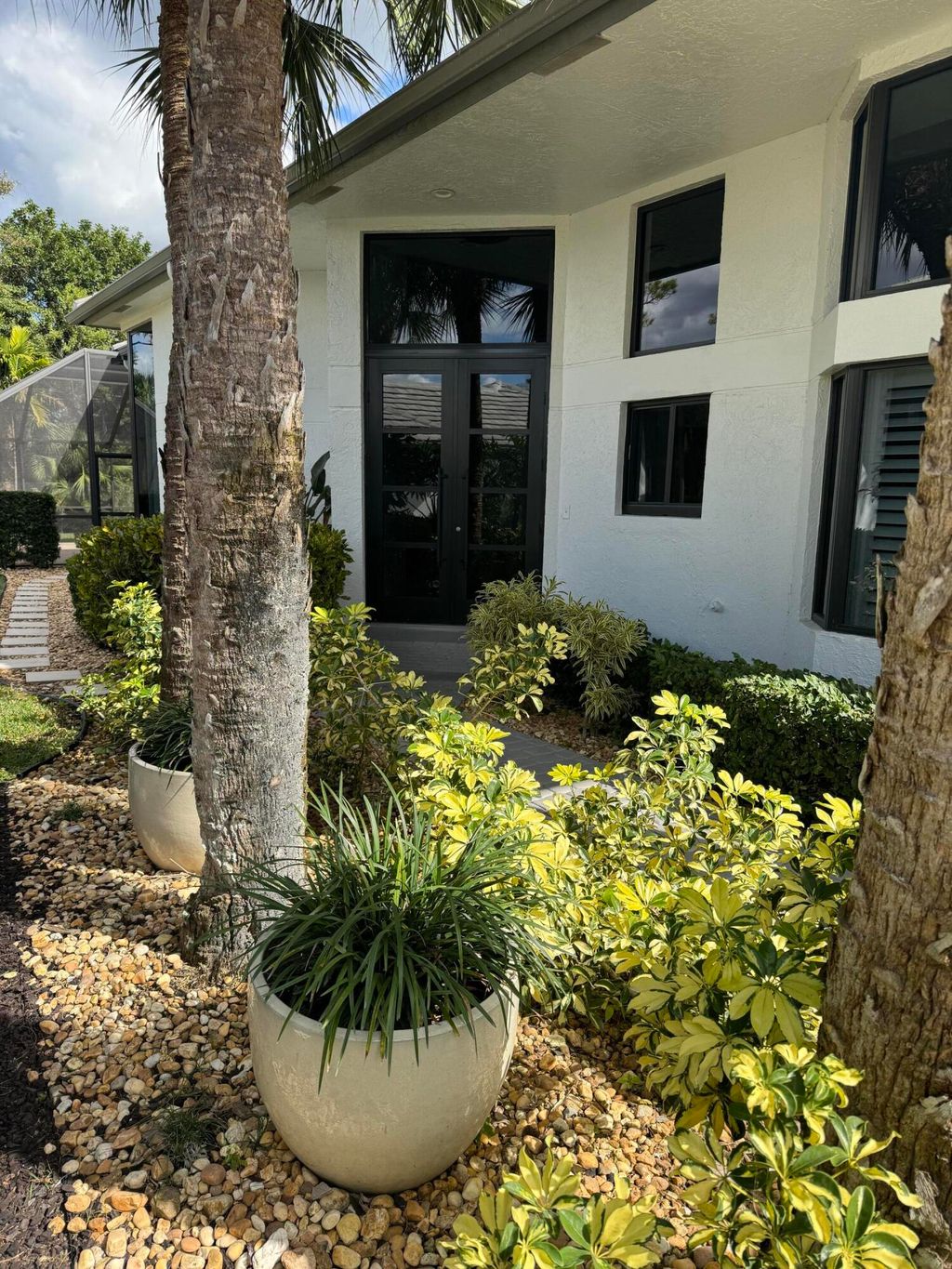 Photo of 1140 Sand Drift Way #A, West Palm Beach, FL 33411 (MLS # R11161657)