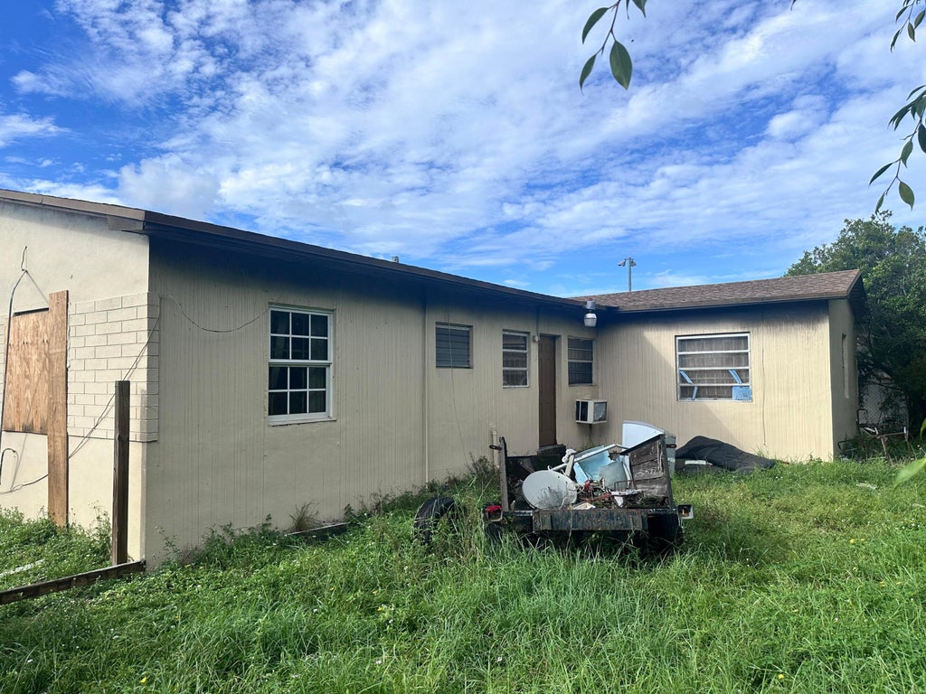Photo of 712 NW 9TH Court NW, Hallandale Beach, FL 33009 (MLS # B26093434)